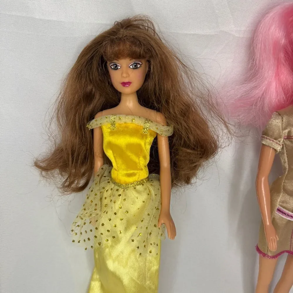 2 Dolls with dresses